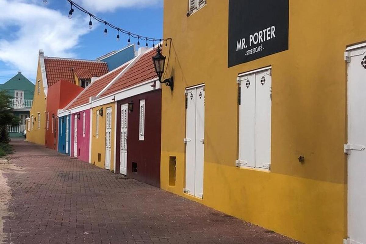 a row of colorful buildings on a street