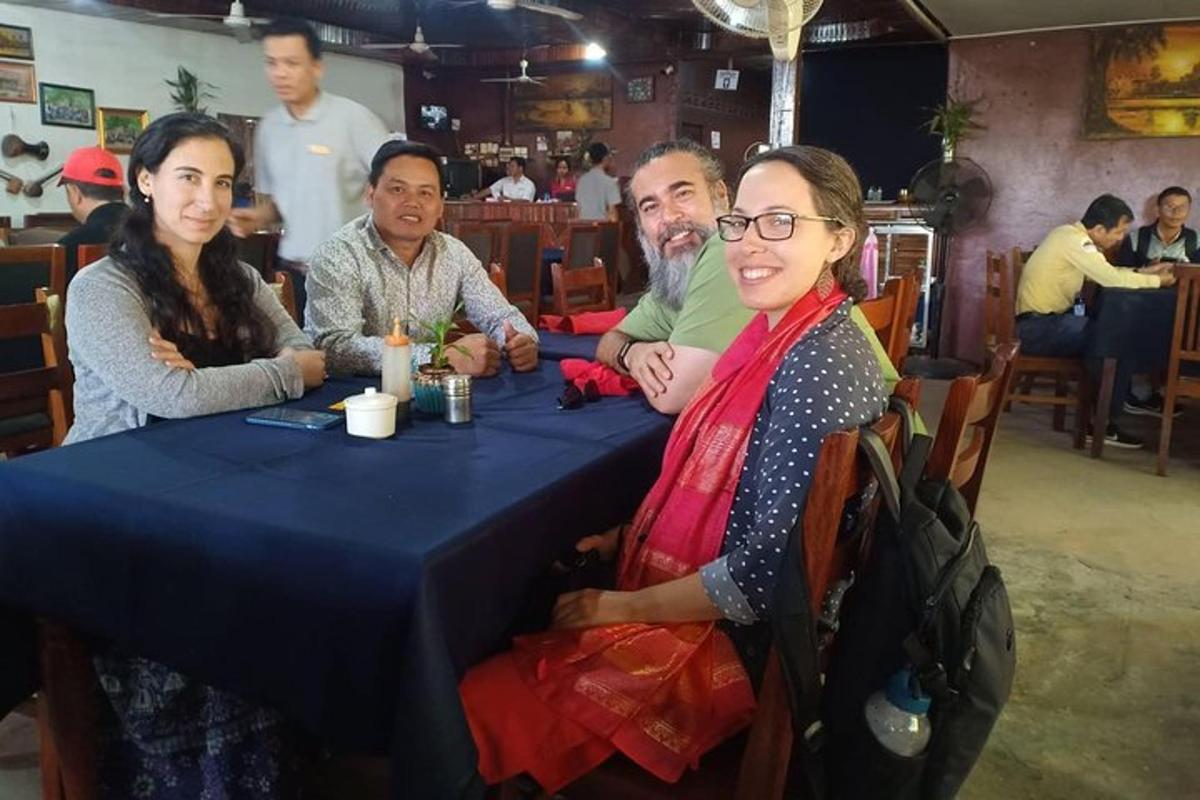 a group of people sitting at a table