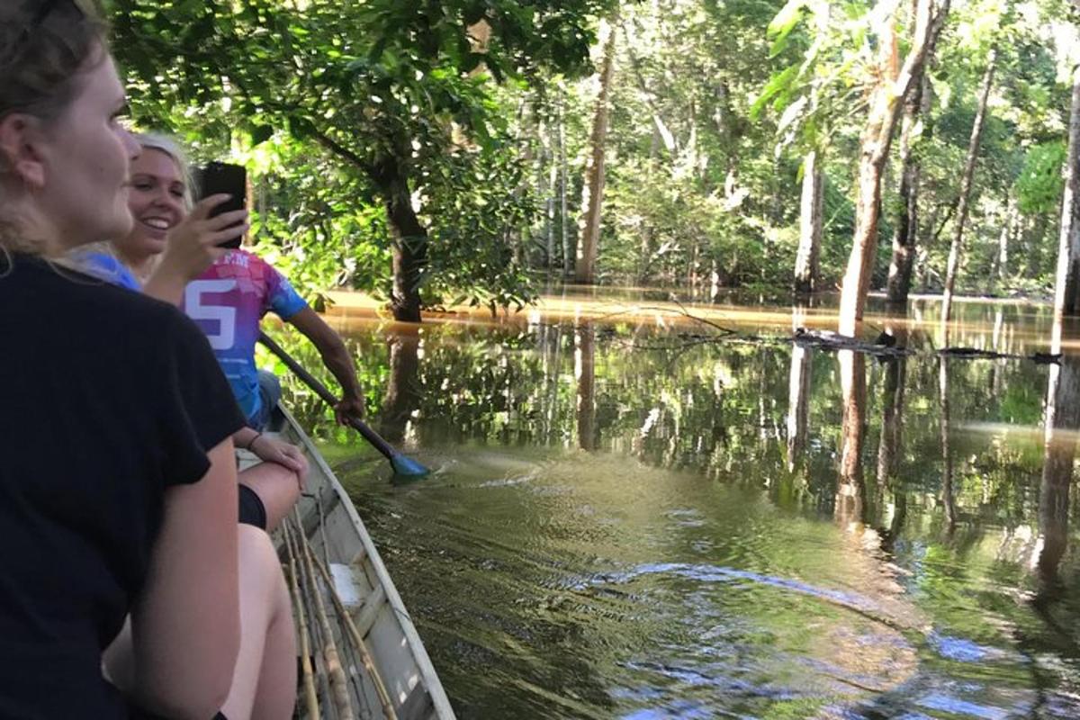 a group of people riding on a boat in the water