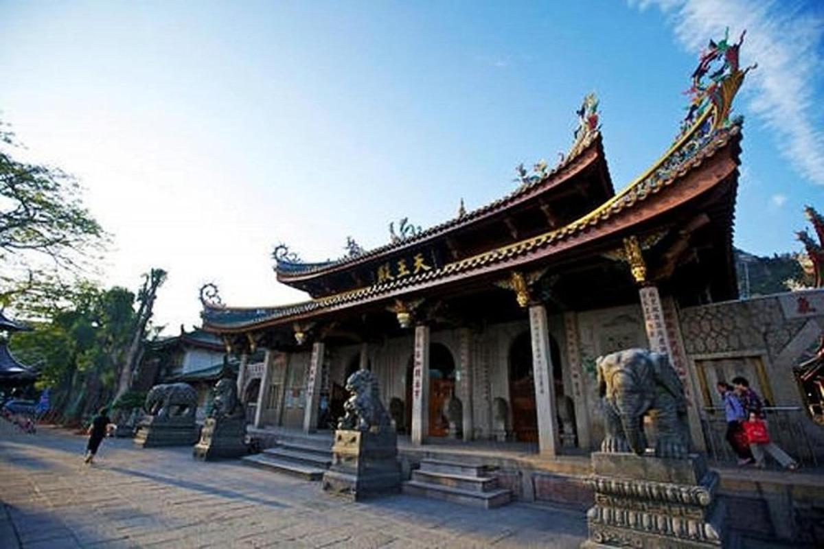 a building with an elephant statue in front of it