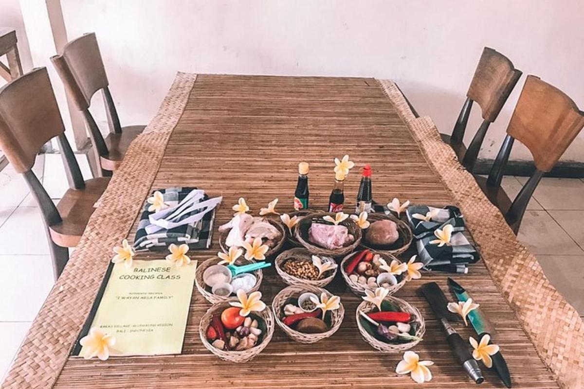 a wooden table with bowls of food on it
