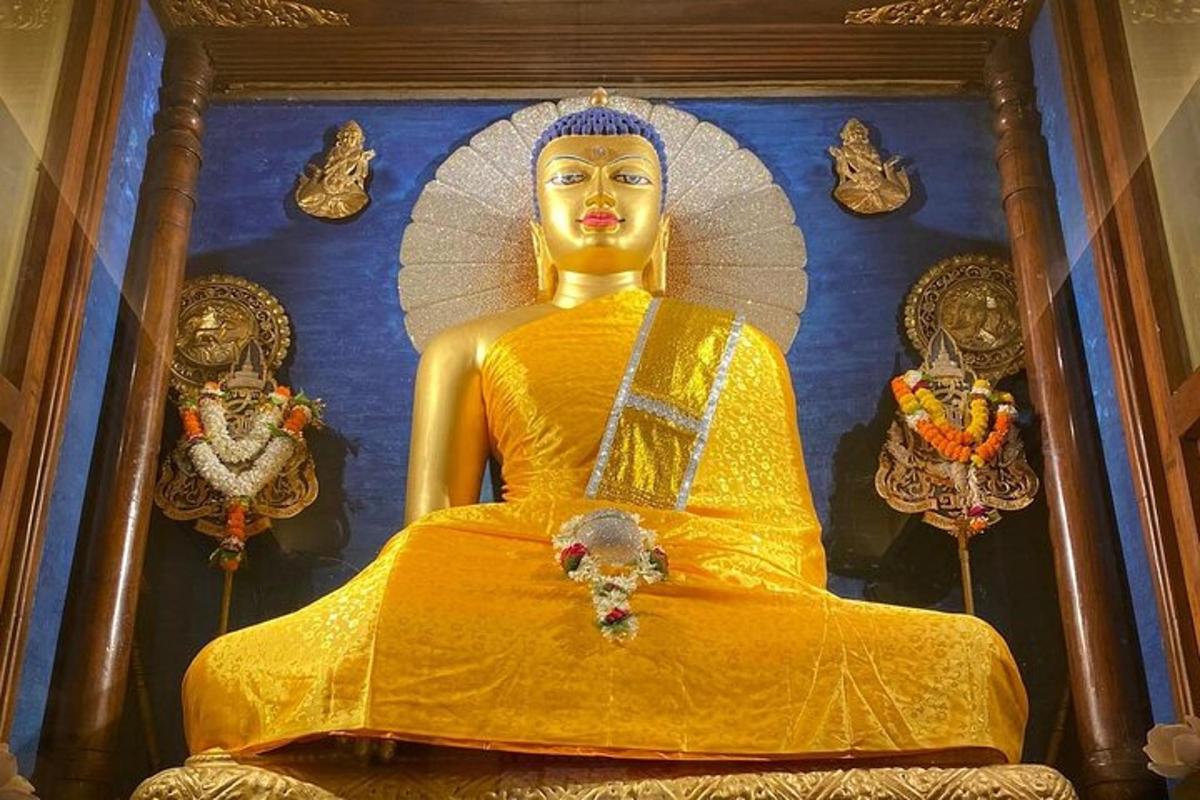 a statue of a woman in a yellow dress