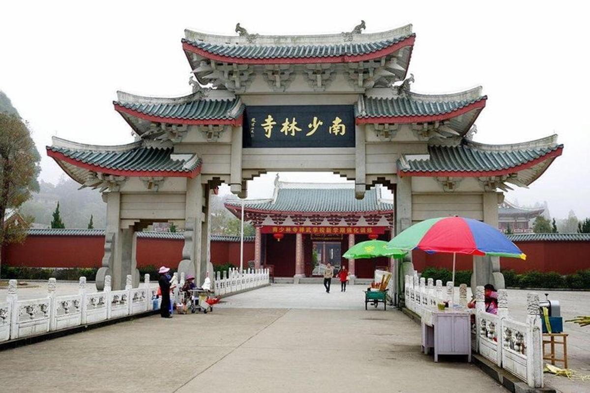 a large building with an umbrella in front of it