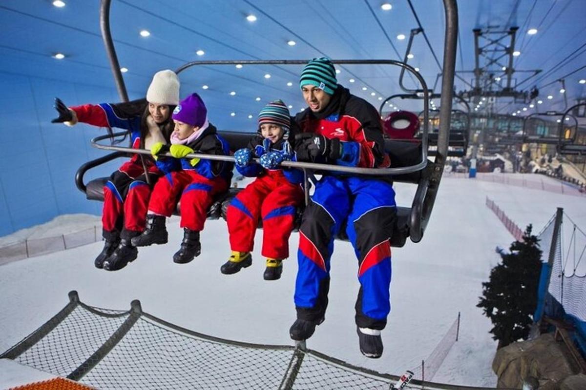 a group of people riding on a ski lift