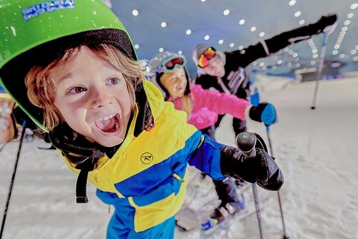a young child on skis in the snow