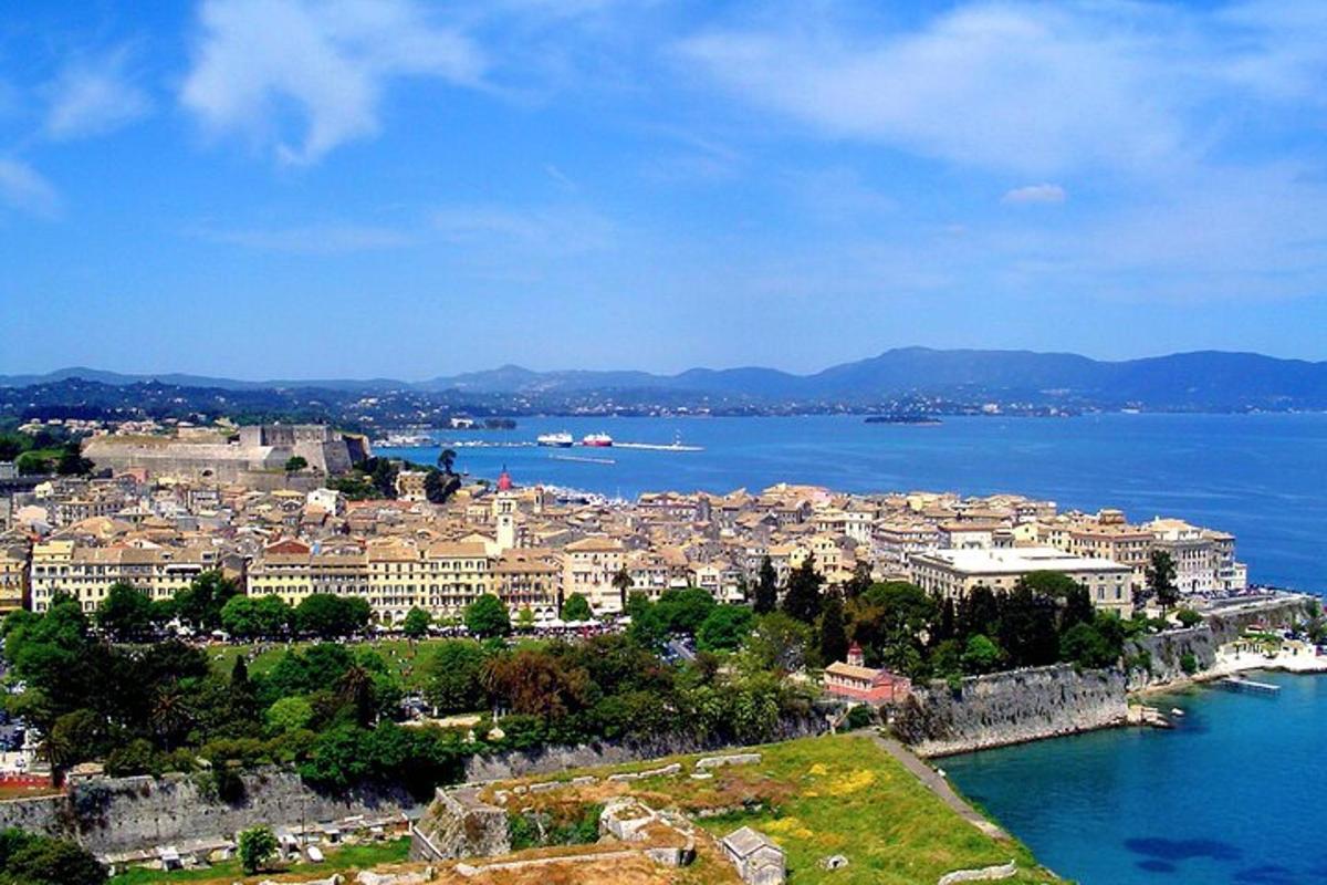 a view of a city with the water and buildings
