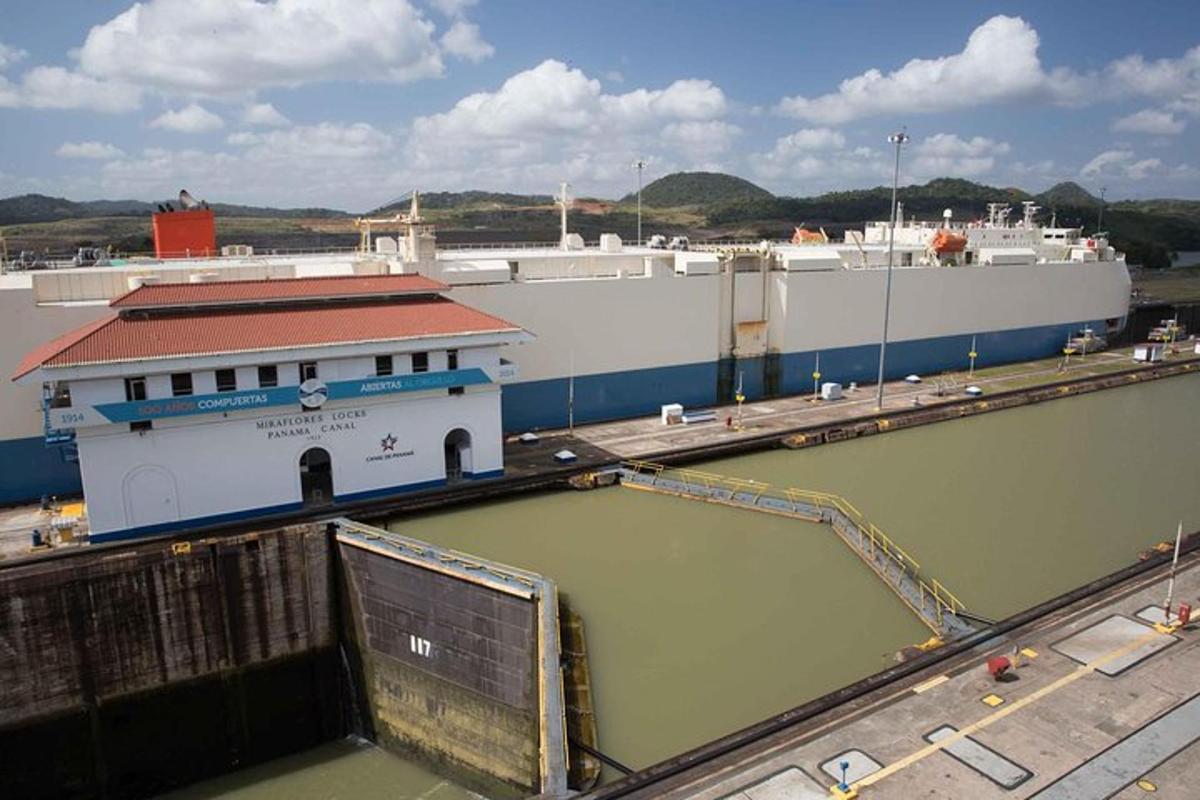 a large building next to a large body of water