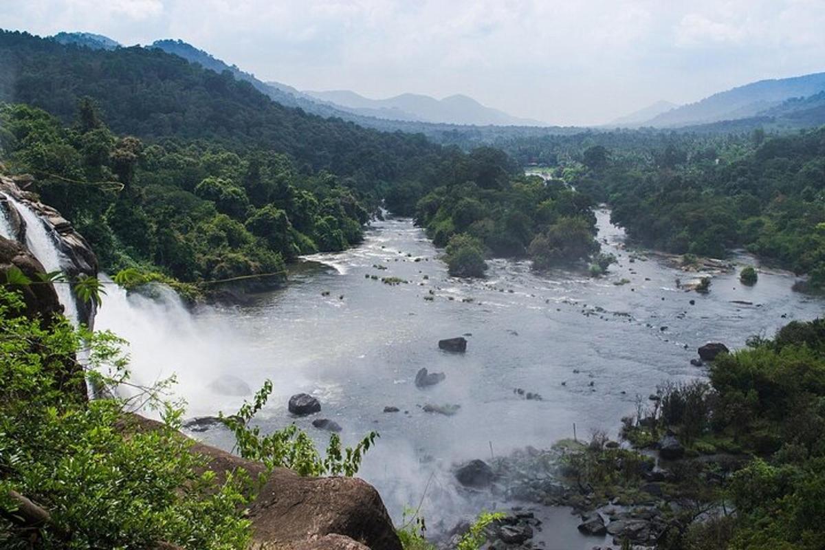 a view of a river with a waterfall