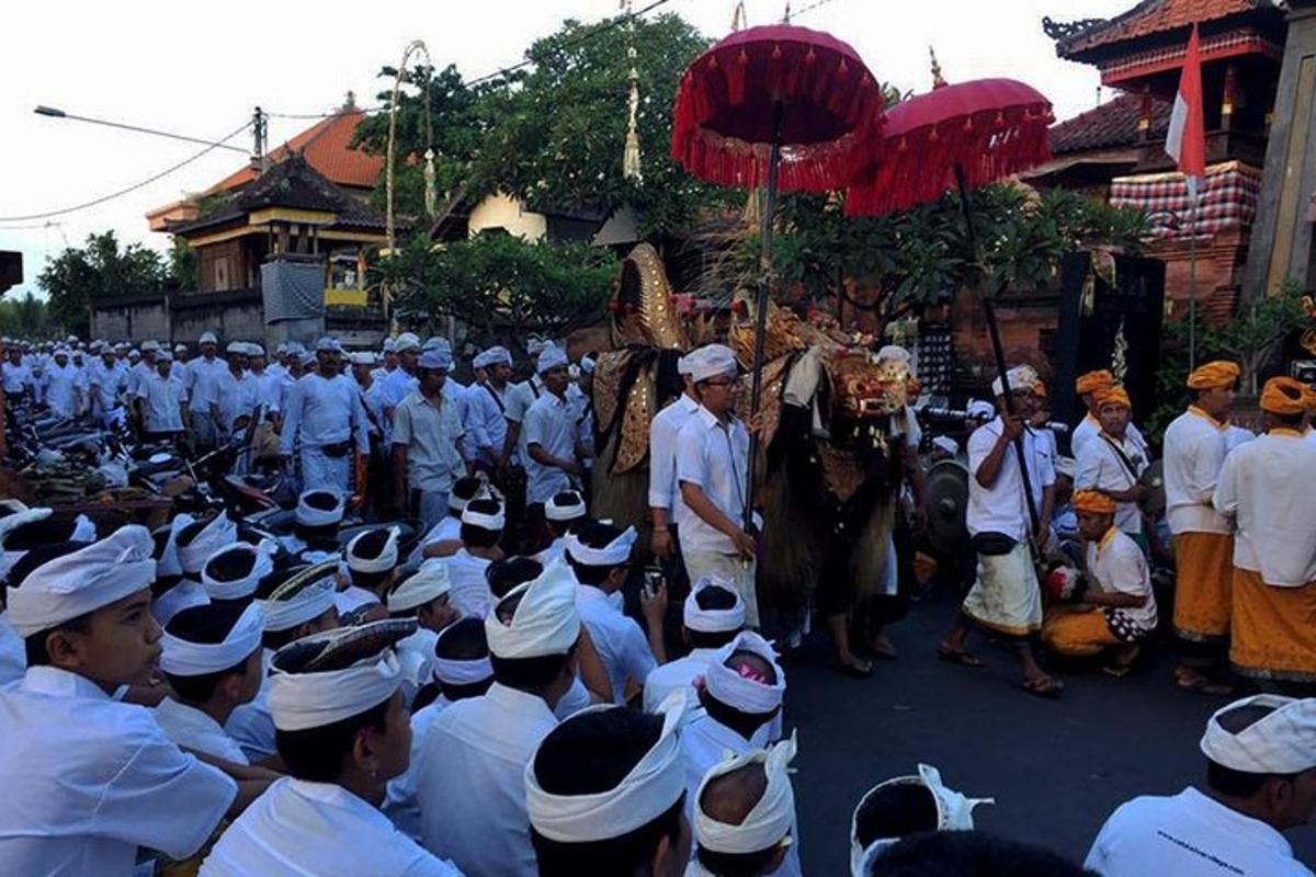 a large group of people wearing hats in a parade