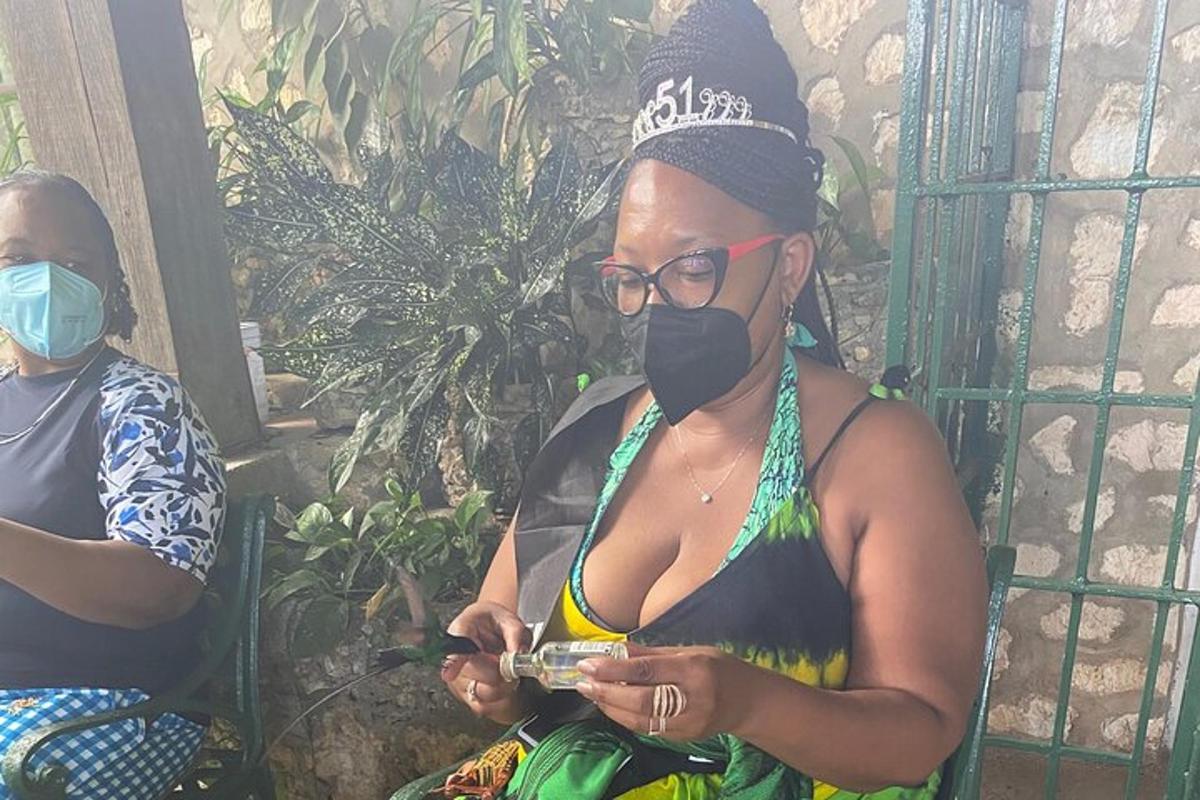 a woman wearing a mask while looking at her cell phone