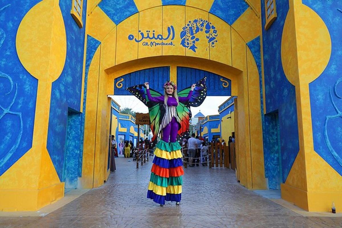 a woman in a colorful dress standing in front of a building