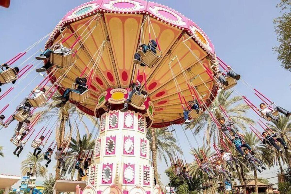 a large carnival ride in a amusement park