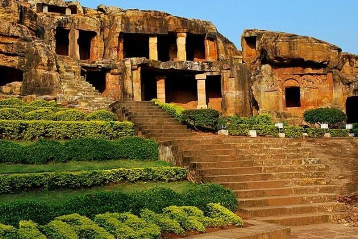a set of stairs in front of a stone building