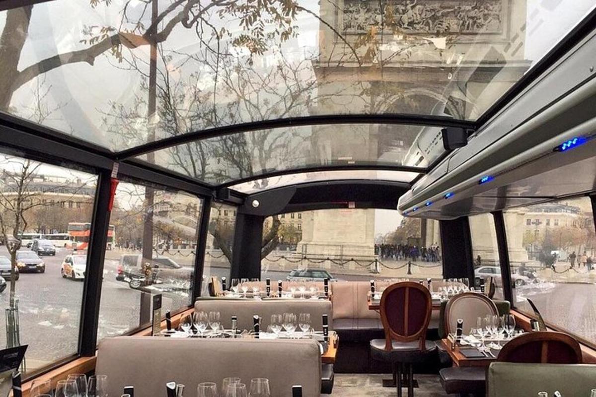 a restaurant with tables and chairs and a view of a street