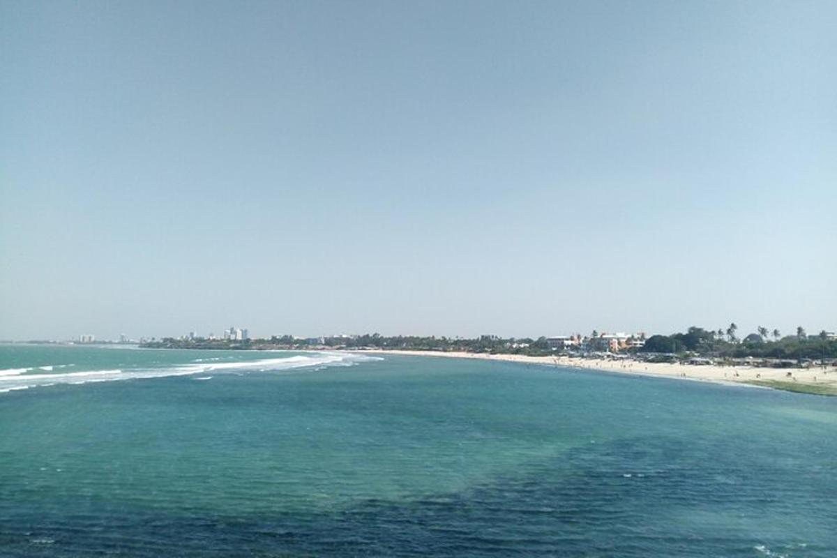 a view of a beach with the ocean