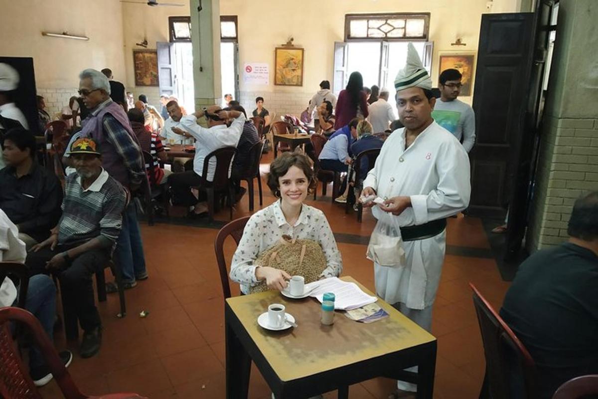 a man and a woman sitting at a table in a restaurant