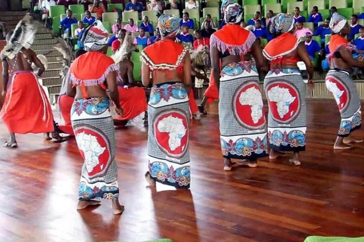 a group of women dancing in a performance
