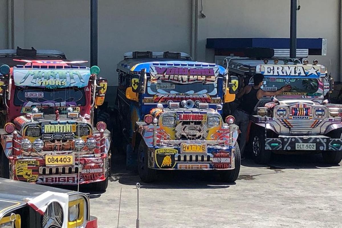 a group of trucks parked in a garage