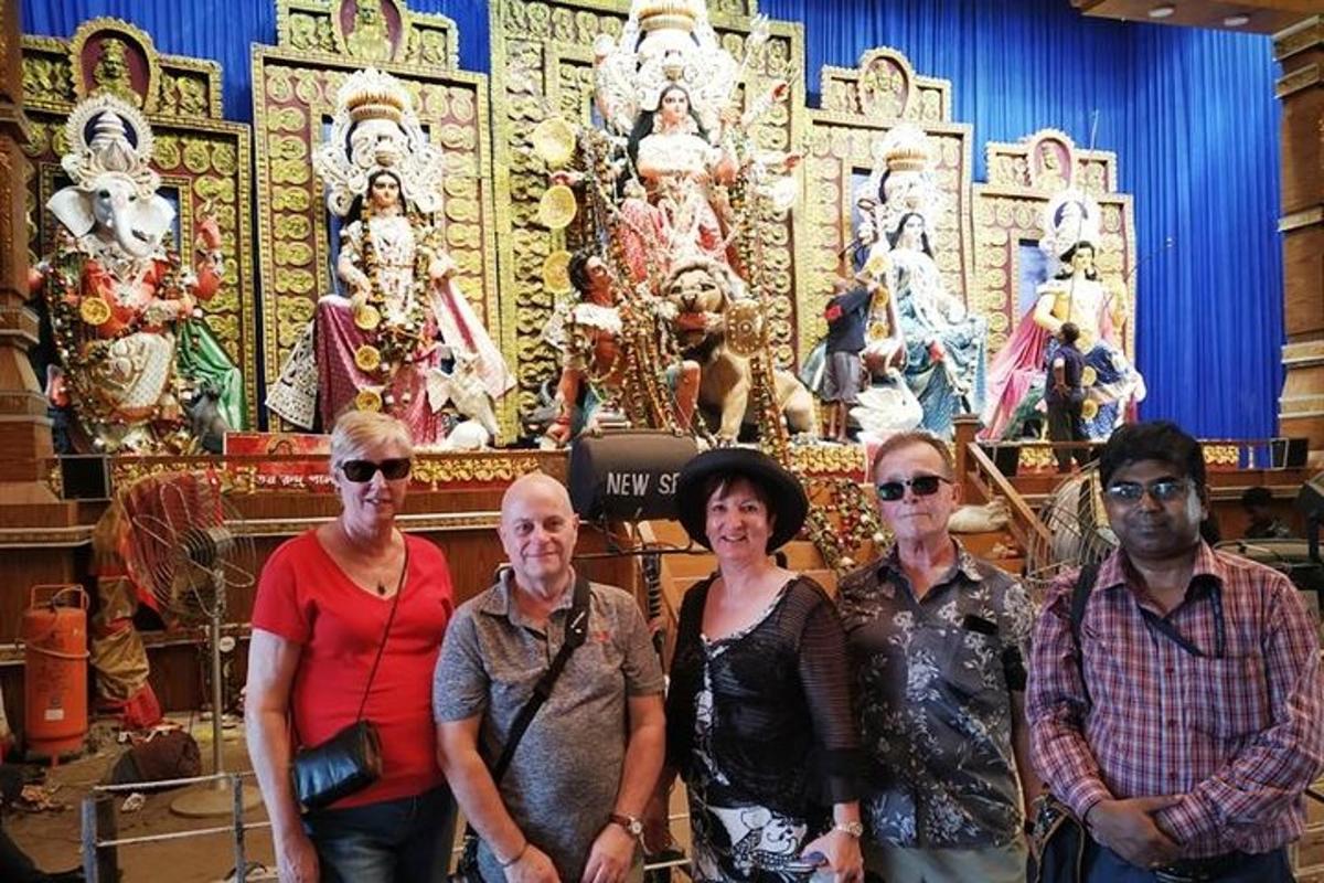 a group of people standing in front of a display