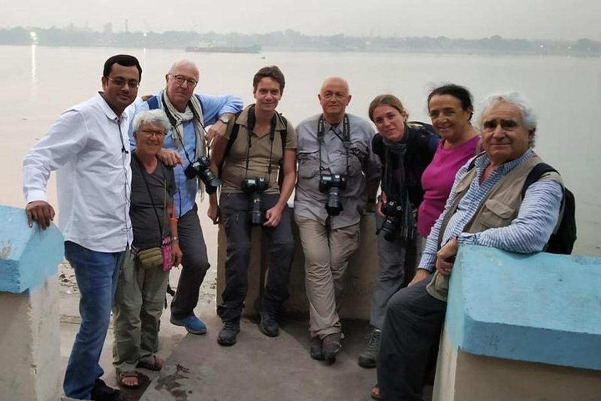 a group of people posing for a picture on a boat