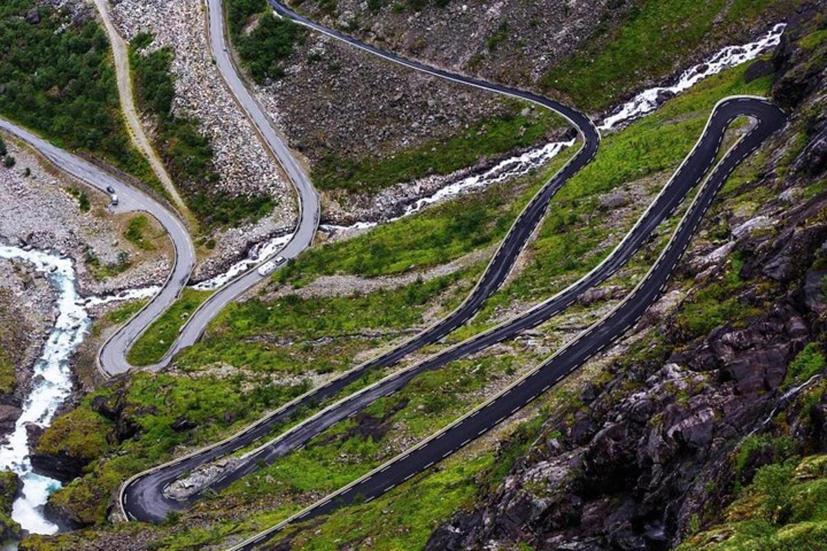 a winding road on the side of a mountain