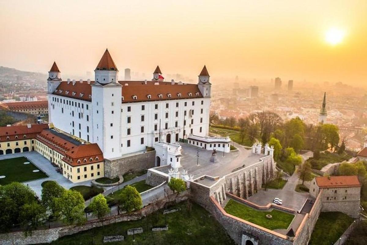an aerial view of a large white castle