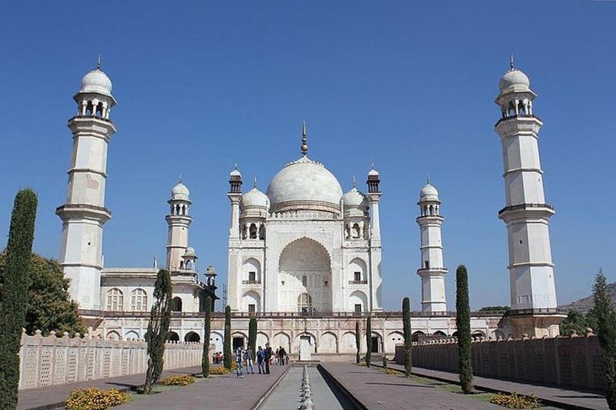 a large white building with tall white towers
