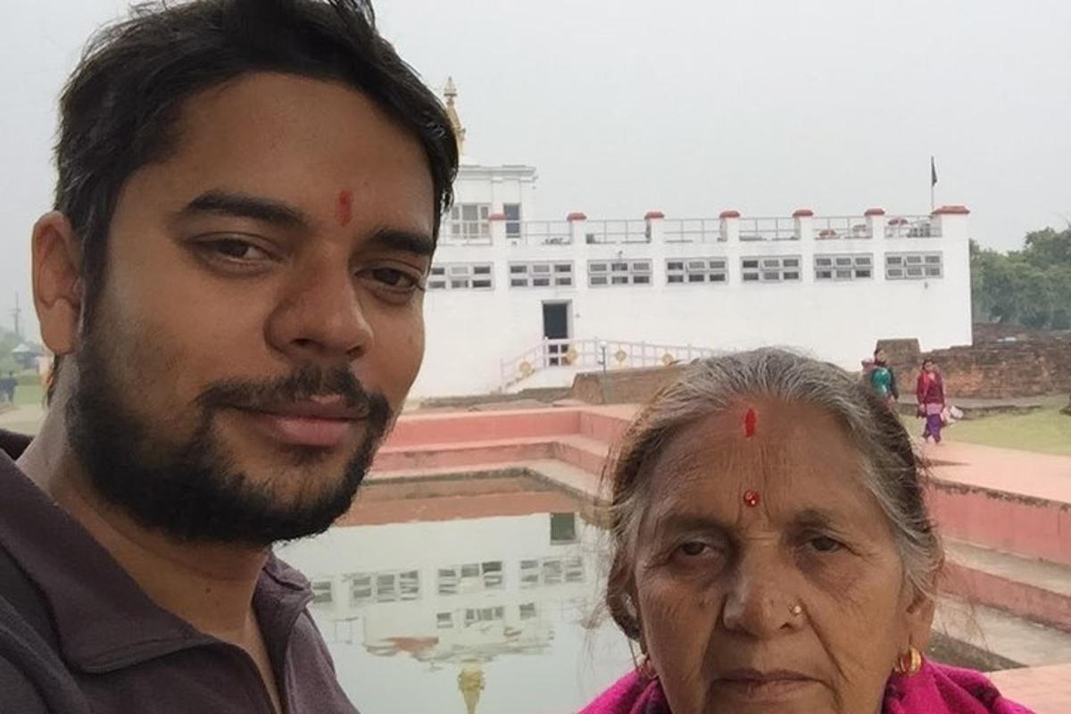 a man and an older woman posing for a picture