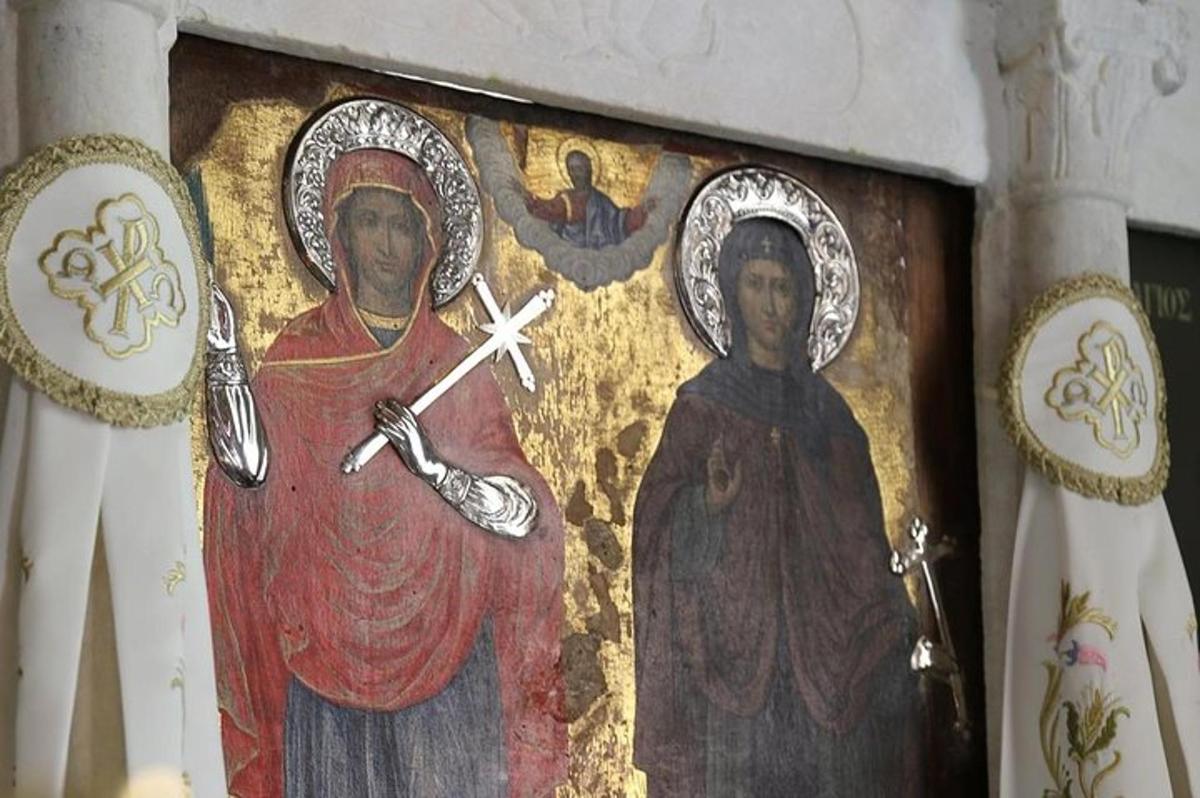 a painting of two women on a wall