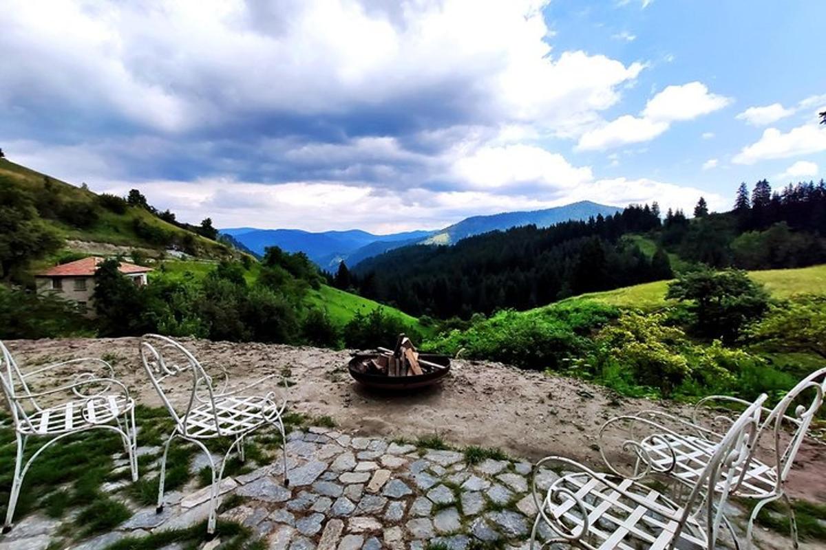 a person is sitting in a boat on a mountain