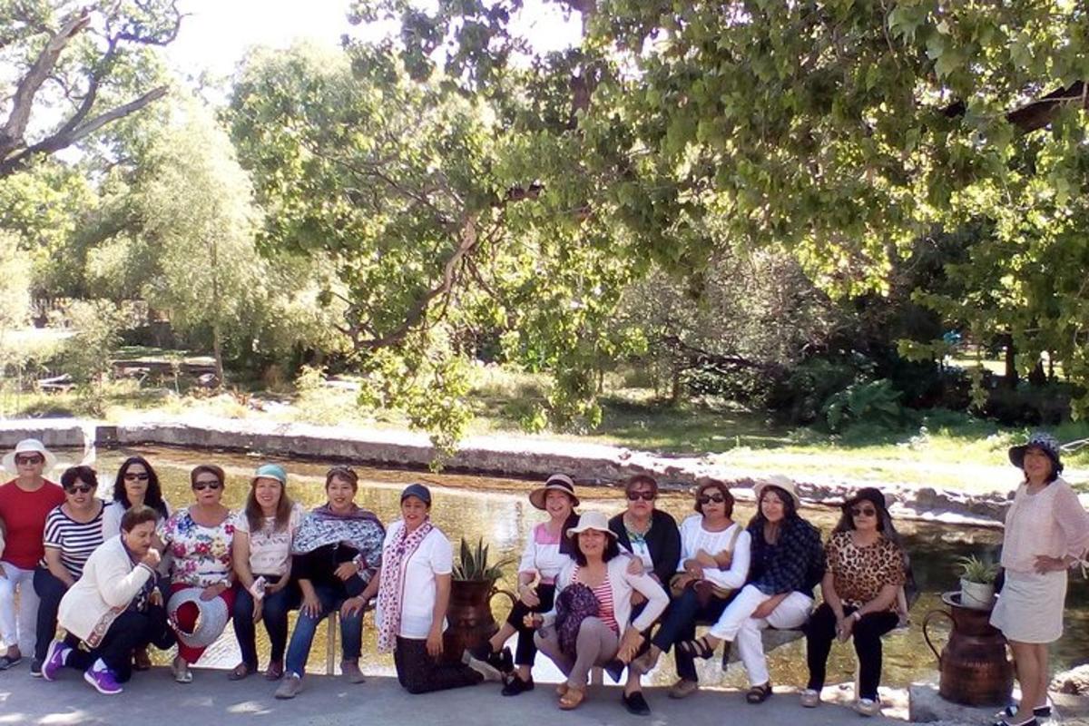 a group of people are posing for a picture