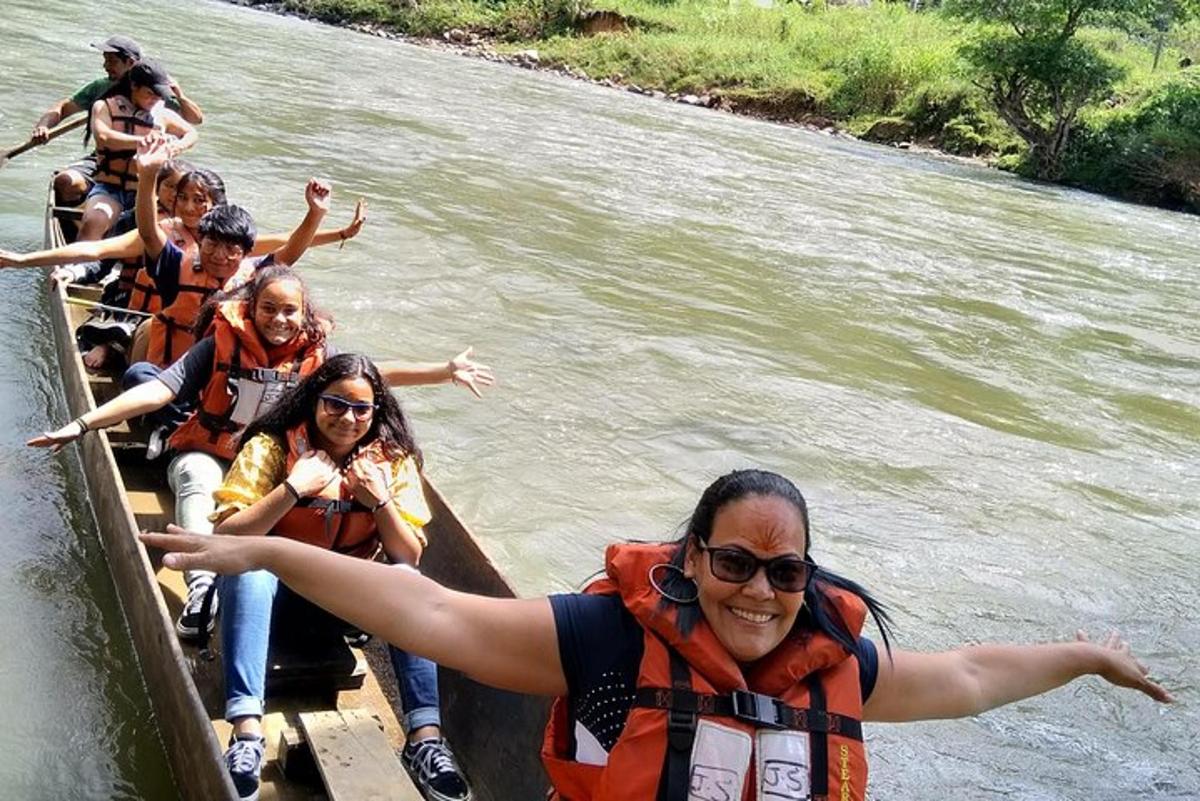 a group of people on a raft on a river