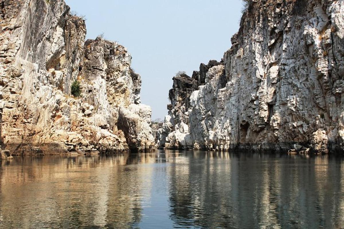 a body of water between two rocky cliffs