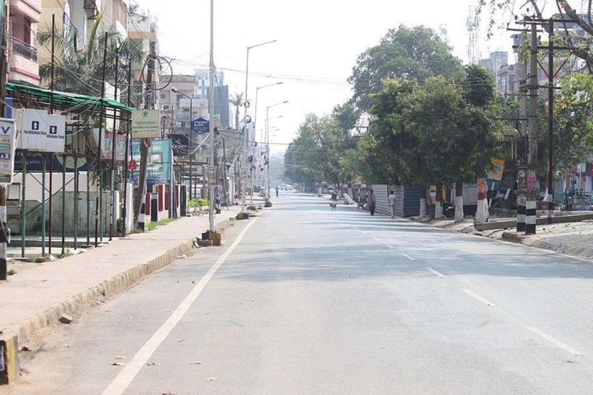 an empty street in a city with buildings