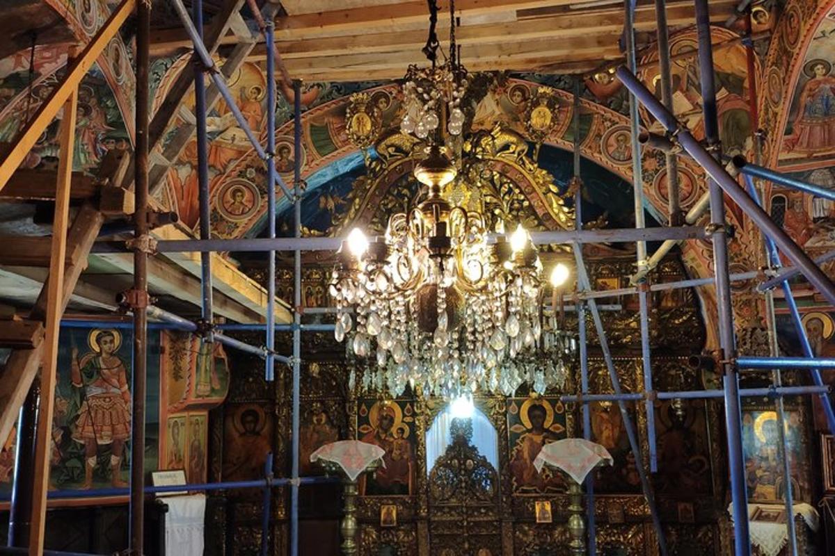 a chandelier hanging from the ceiling of a church