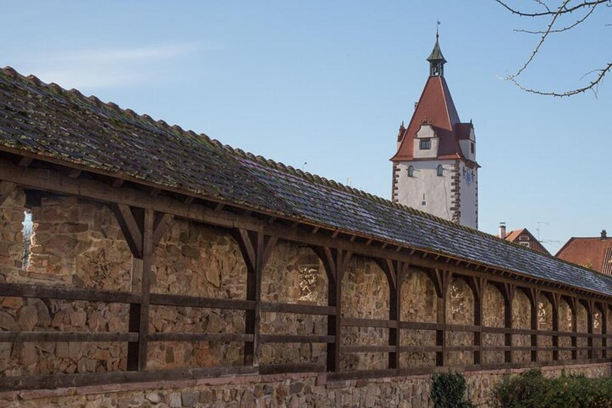a building with a clock tower in the background
