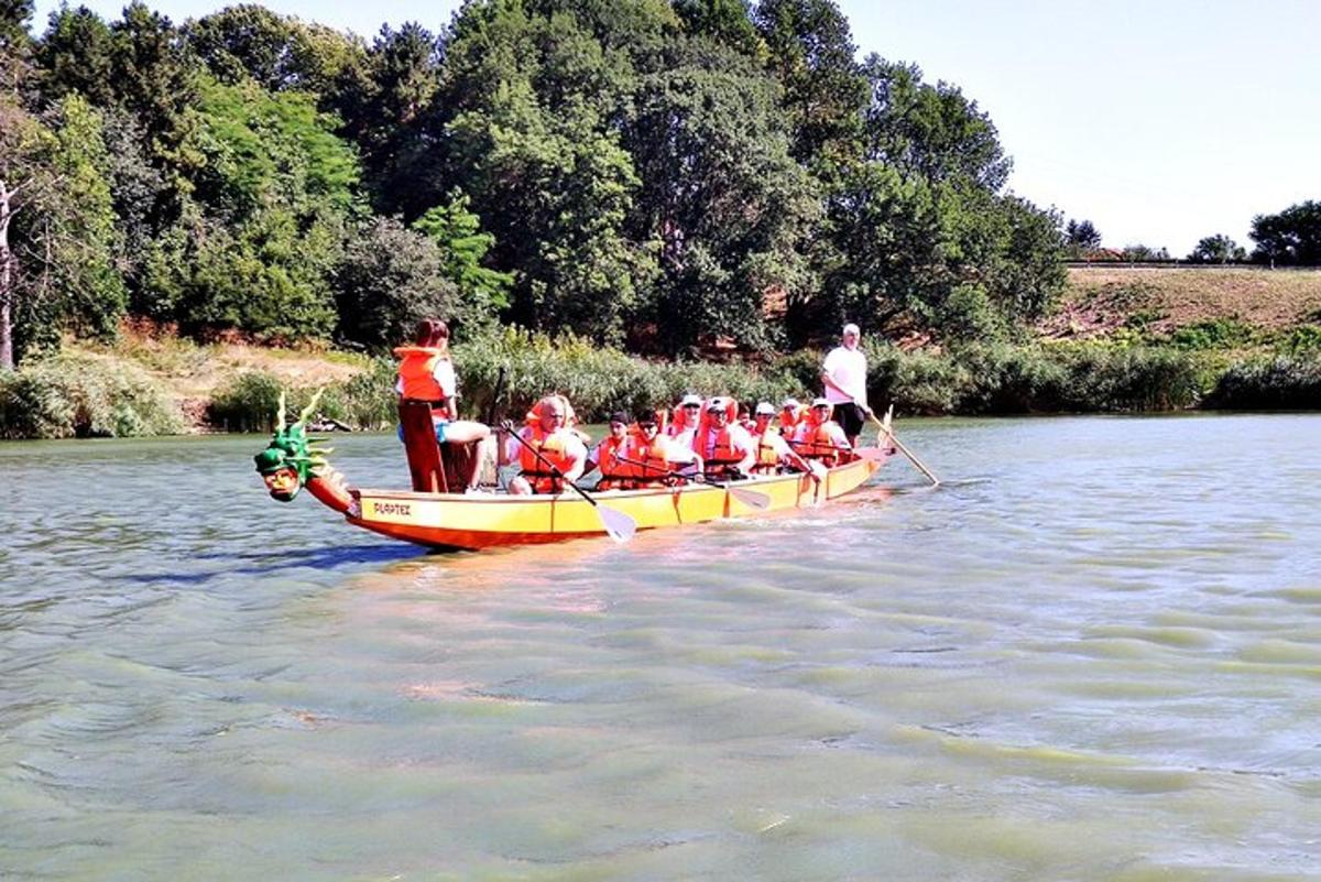 a group of people in a boat on a river