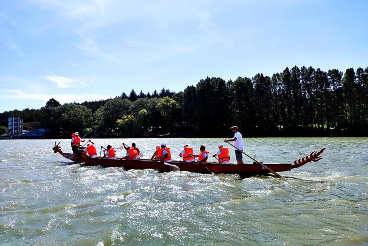 a group of people in a boat on a river