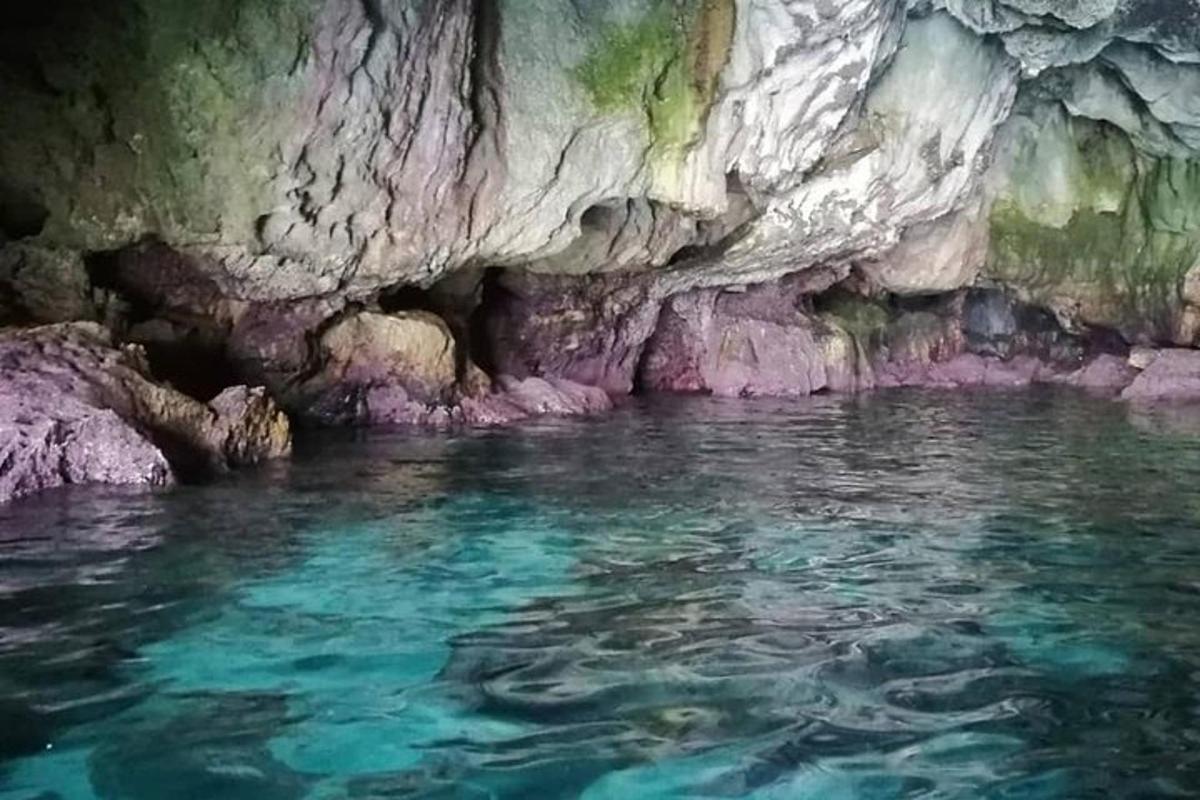 a pool of water in a cave