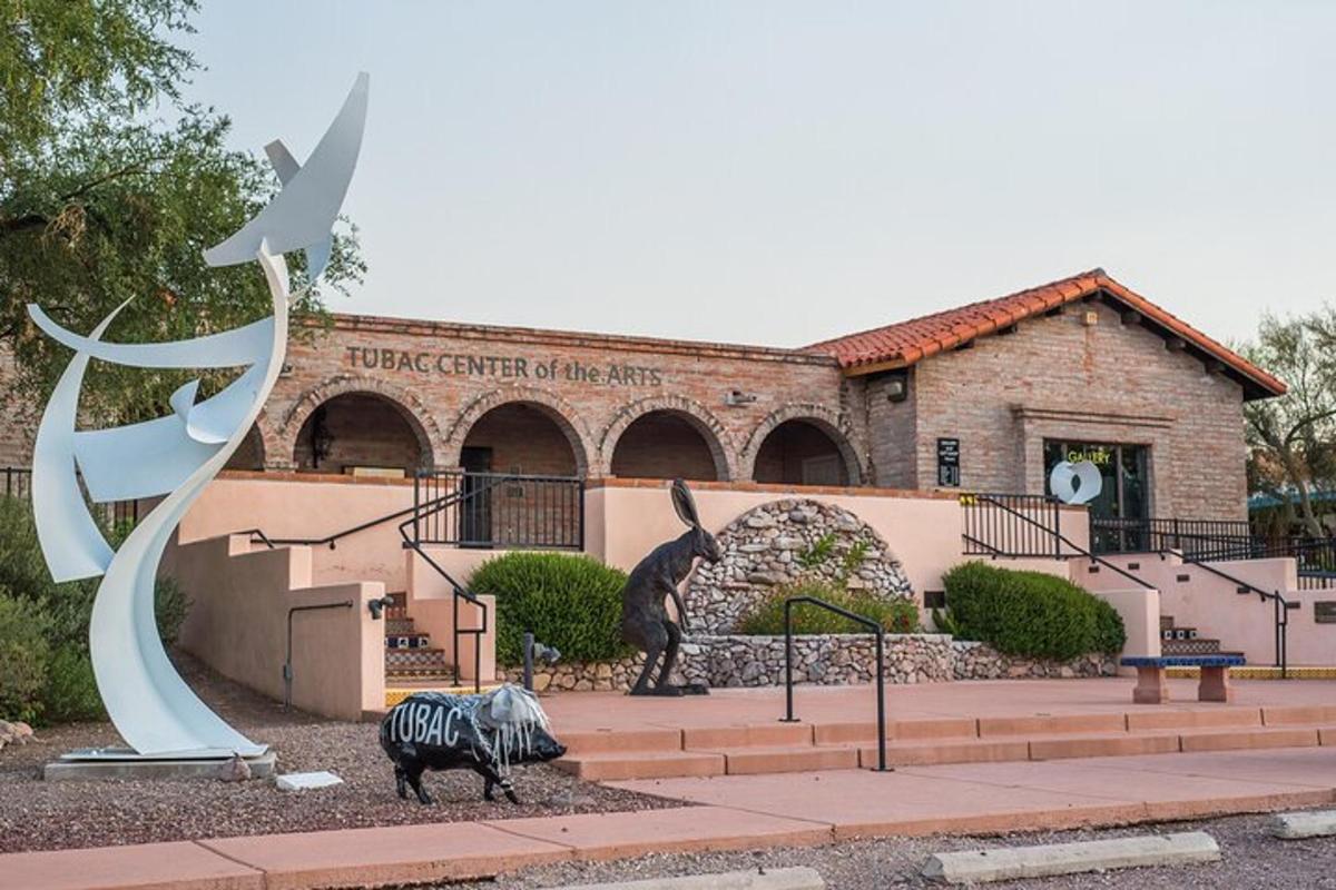 a museum with a statue of a zebra in front of a building