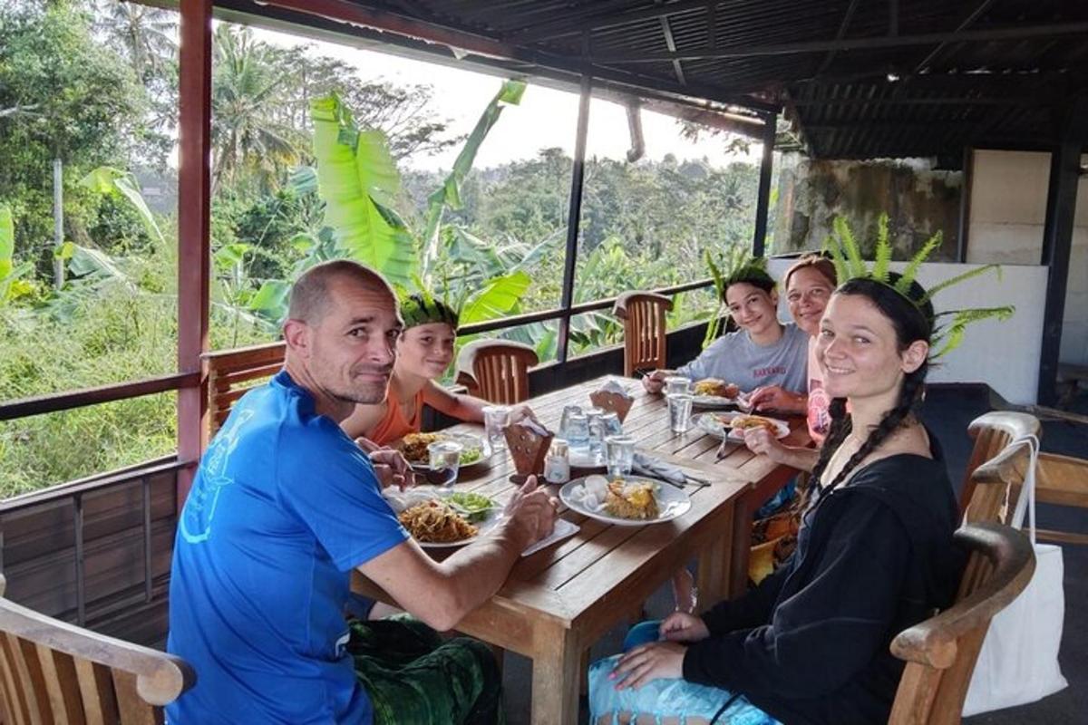 a group of people sitting at a table eating food