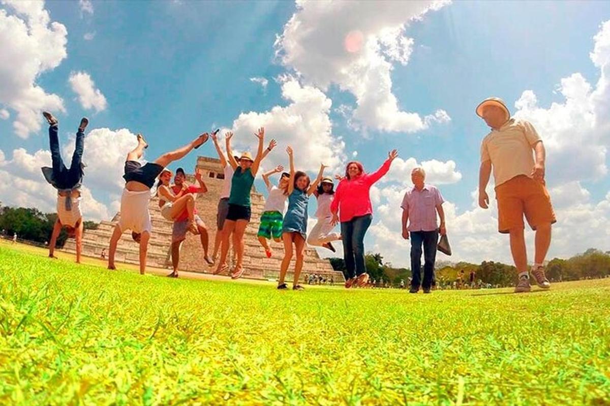 a group of people jumping in a field