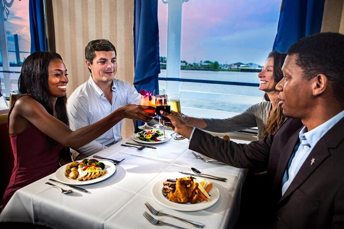 a group of people sitting around a table with drinks