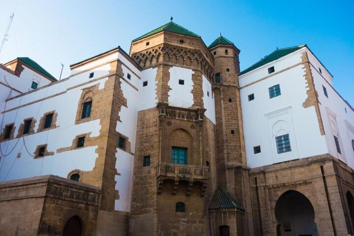a building with two towers on top of it
