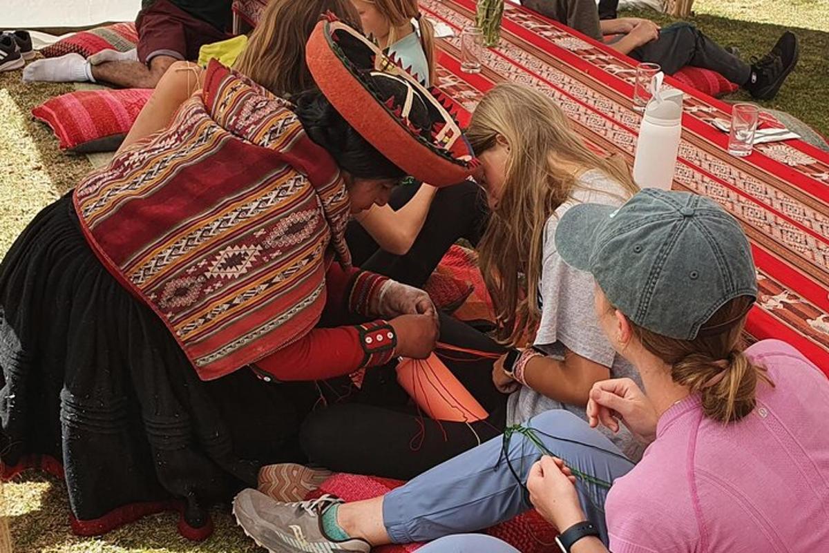 a group of people sitting on the ground