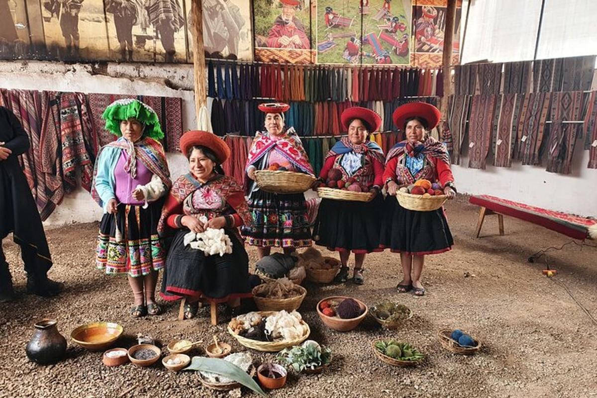 a group of women posing for a picture with baskets of food