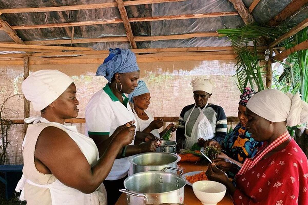 a group of people in a kitchen preparing food