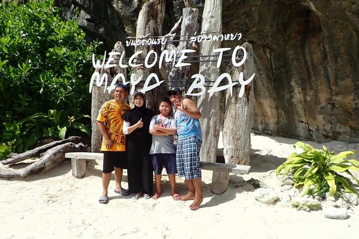 a group of people standing in front of a sign