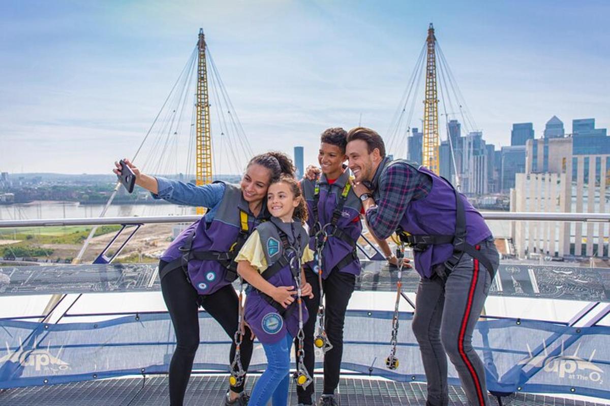 a group of people standing on the top of a building