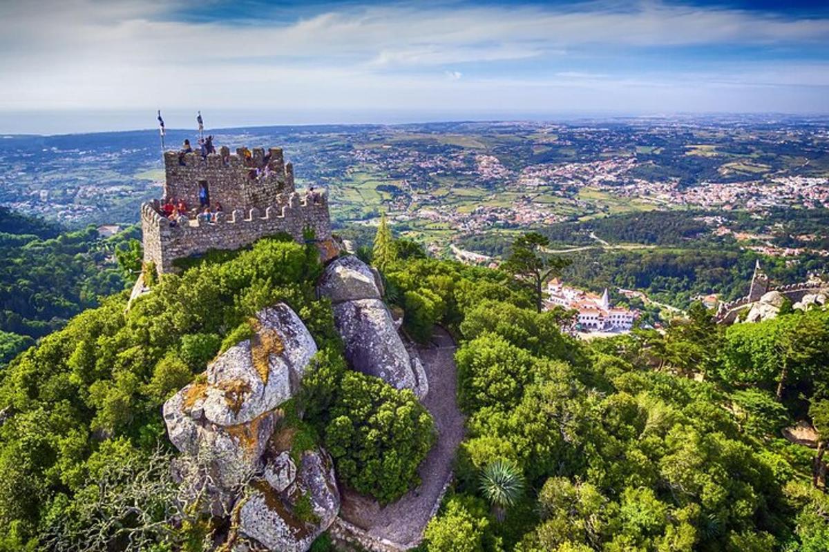 a castle on the top of a mountain